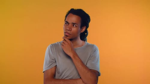 African Man with Pensive Expression, Comes Up Solution To Complex Problem