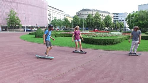 Cool young skateboarders having fun in the city