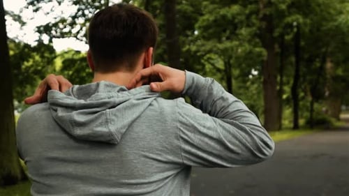 Runner Sportsman Put on Hook While Running in Park