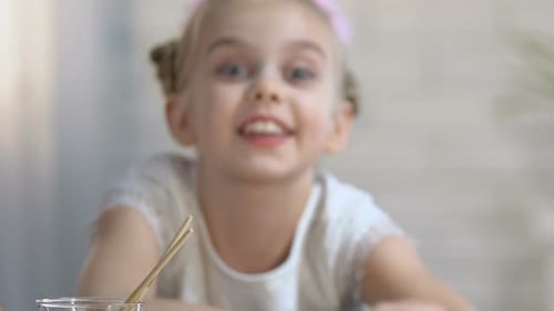 Cute Girl Smiling with Bunny Ears Headband