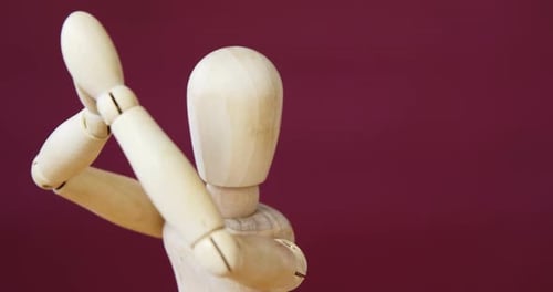 Figurine performing stretching exercise