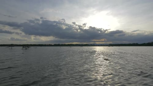 Lake and cloudy sky