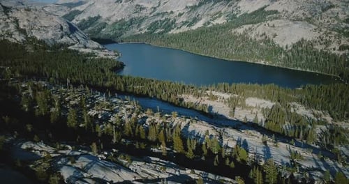 Amazing White Rocky Ridge Landscape To Reveal Large Mountain Lake at Summer