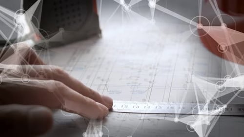 Man Makes Notes on the Blueprints