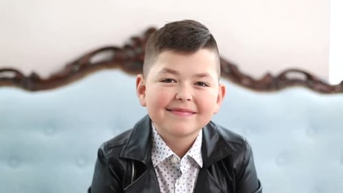Smiling Boy Posing Indoors