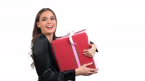 Woman Holding Birthday Gift Wrapped in Polka Dots