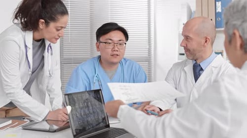 Diverse Doctors Working in Office