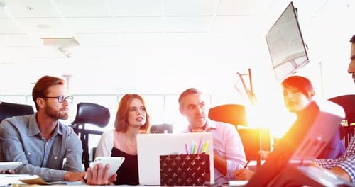 Diverse Business Team Meeting in Bright Modern Office