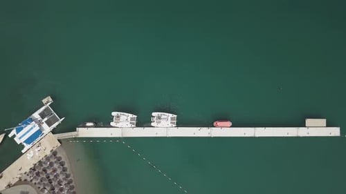 White Boats, Yachts and Catamarans Parked in Marina