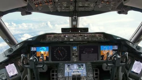 Modern passenger plane. View from the cabin on the Сcloud in the sky.
