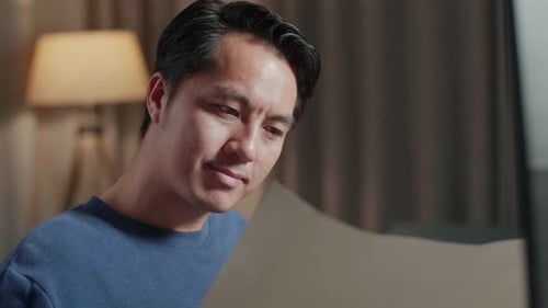 Architect Designs Building Plan in Home