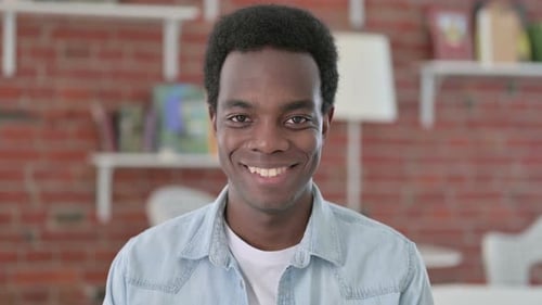 Smiling Young Adult Portrait in Casual Setting