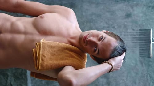 Attractive Man with Wet Hair in Shower