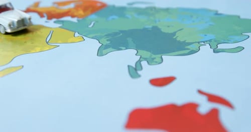 Miniature car on a map
