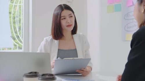 Young businesswoman during job interview at the office