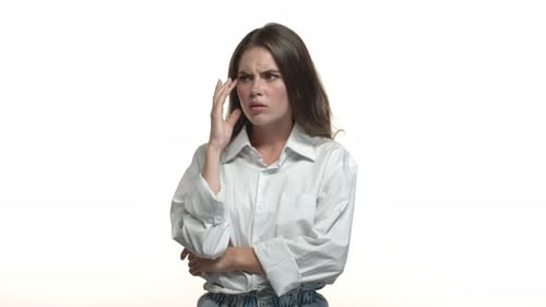 Video of Beautiful Caucasian Woman in White Collar Shirt Having Inner Conversation with Herself