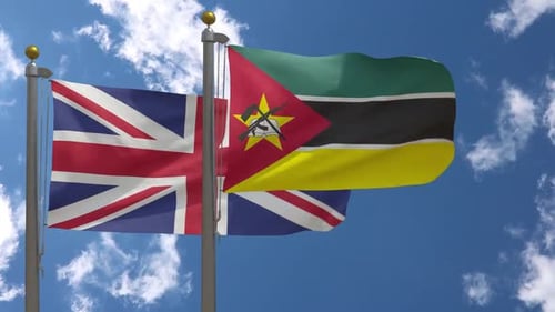 United Kingdom and Mozambique Flags Waving on Flagpoles