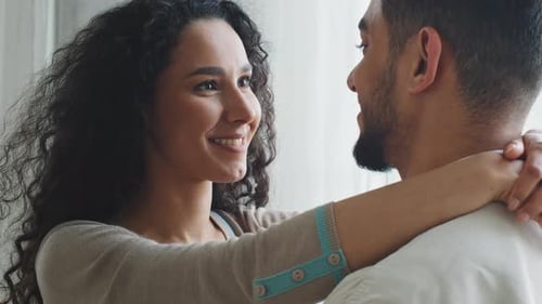 Affectionate Couple Embracing Tenderly Indoors