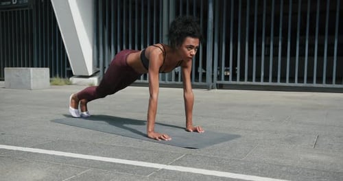 Woman Does Mountain Climbers Outside