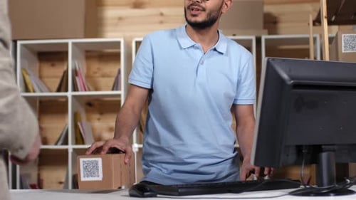 Young Adult Working at a Mailing Office
