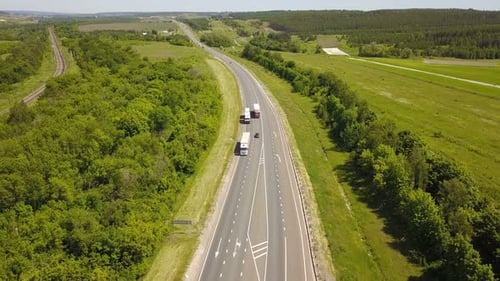 Aerial View of Cars and Trucks on Highway