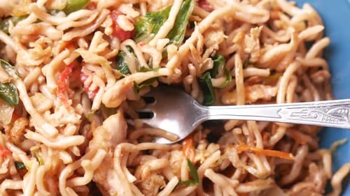 Close Up of Eating Noodles in a Bowl