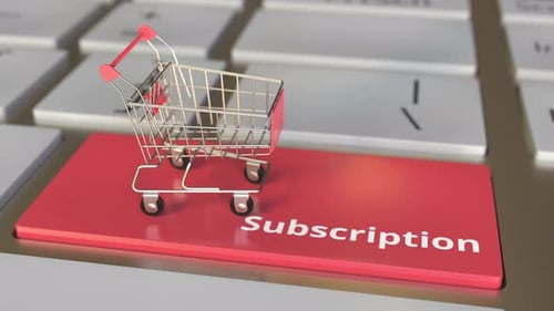Subscription Text on Keyboard and Boxes in Small Shopping Cart