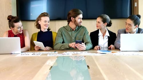 Young Professionals Collaborating During an Office Meeting