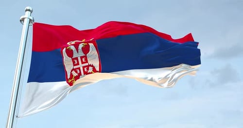 Waving Serbian Flag with Coat of Arms on Flagpole