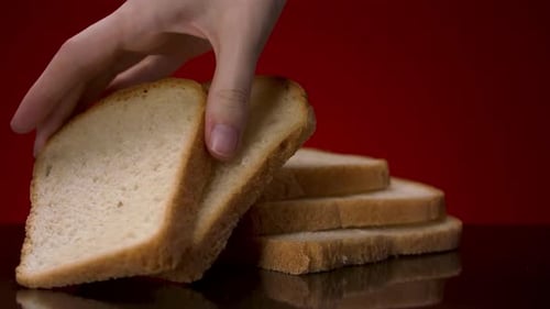 Sliced fresh bread lies on the table