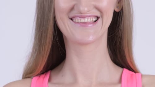 Smiling Woman, Close-Up of Face in Bright Light