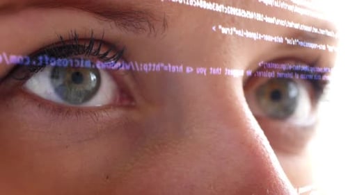 Woman's Face with Digital Code Projection Close-Up