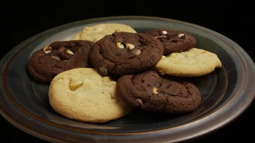 Delicious Chocolate and Vanilla Cookies on Plate