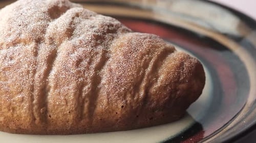 Fresh Baked Croissant on Plate with Copy Space