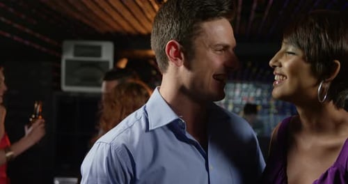 Couple enjoying with each other in pub