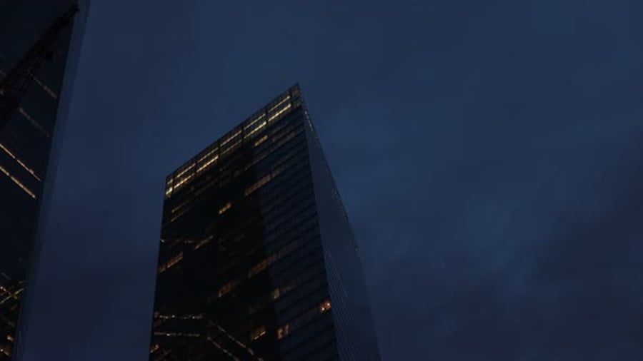 Cover for The Central Building Upward View of New York Skyscrapers at Dusk