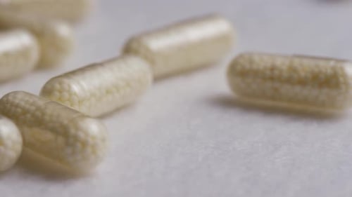 Rotating stock footage shot of vitamins and pills - VITAMINS 0108
