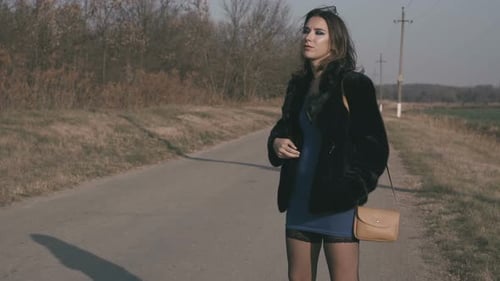 Female Prostitute Standing On The Road