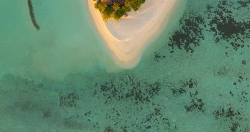 Aerial drone view of a scenic tropical island in the Maldives
