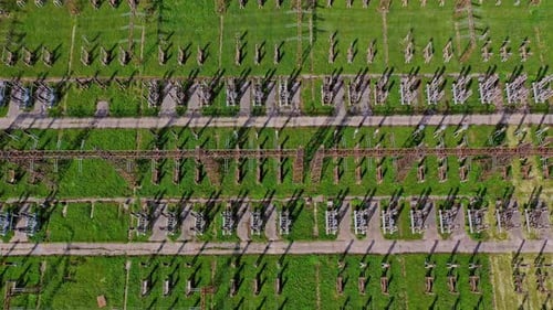 High voltage lines on green field