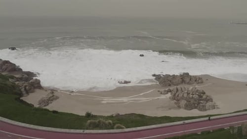 Ocean waves sand and shore