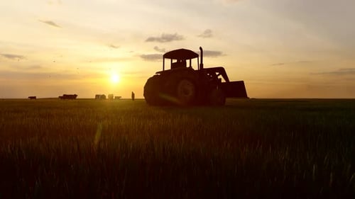 Tractor in the Field and Sunset View