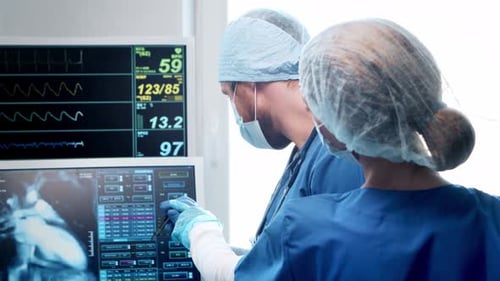 Professional medical doctors working in emergency medicine. Portrait of surgeon and the nurse.