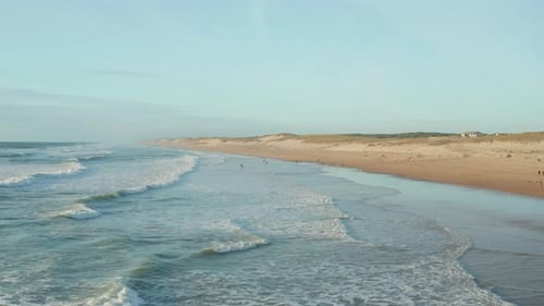 People Enjoying Time at Beach in California in Beautiful Afternoon Light, Aerial High Angle Circling