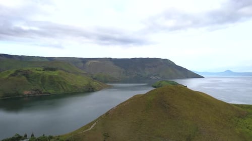 Aerial View of Green Island and Tranquil Lake