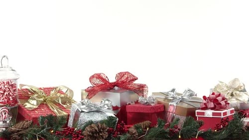 Panning view of gifts against white screen