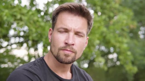 Close-up of Man with Short Brown Hair