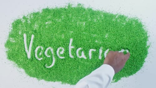 Green Hand Writing Vegetarian