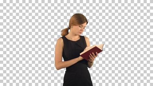 Young girl with book on laptop, Alpha Channel