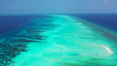 Daytime birds eye abstract view of a sunshine white sandy paradise beach and turquoise sea